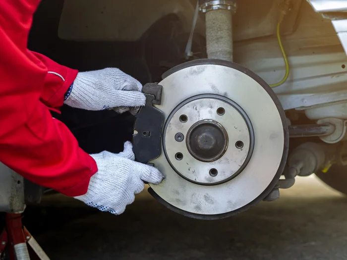 Process of replacing brake pads with Brand new.